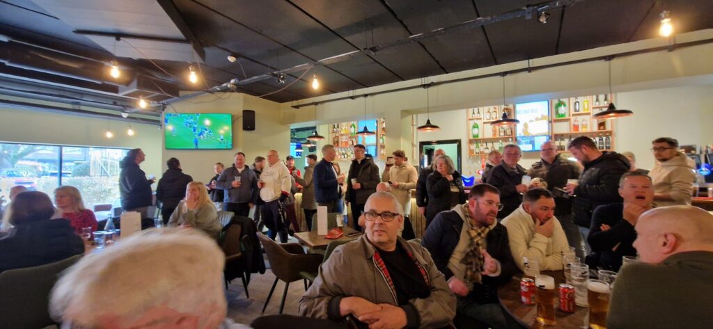 People gathering and chatting in The Haven Lounge & Bar
